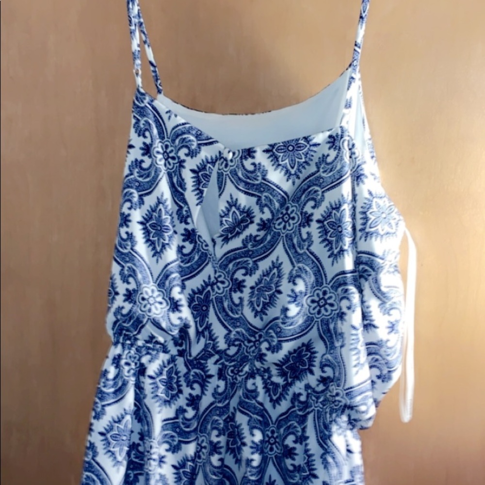 Bisou Bisou romper with blue and white designs